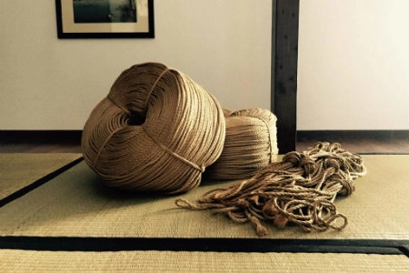 Jute rope coils for Shibari practice on traditional Japanese tatami mat